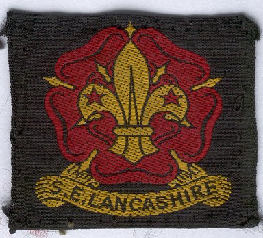 [South East Lancashire District Badge]