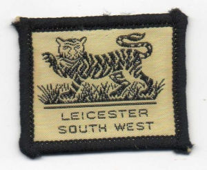 [Leicester South West District Badge]
