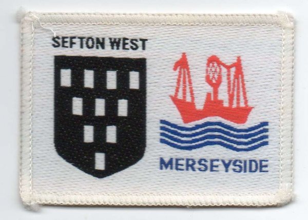[Sefton West @ District Badge]