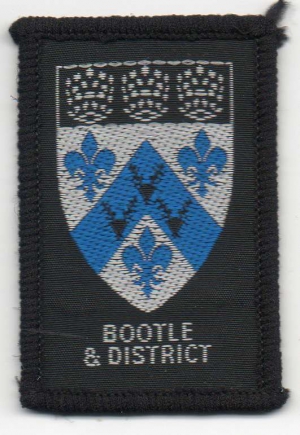 [Bootle & District District Badge]