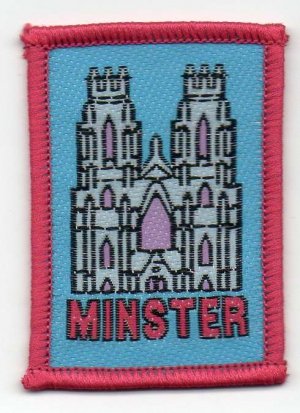 [Minster District Badge]