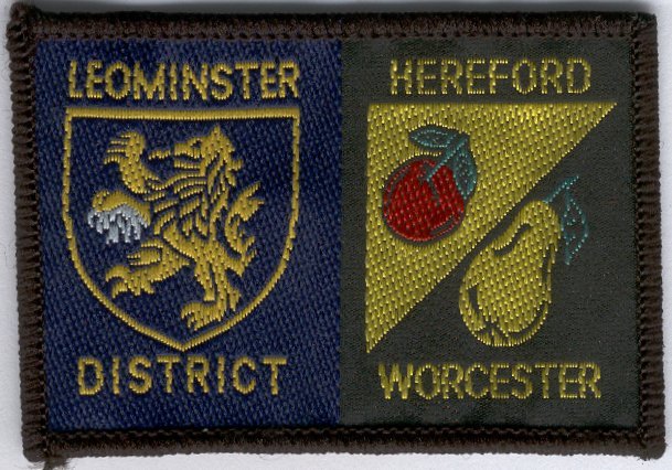 [Leominster @ District Badge]