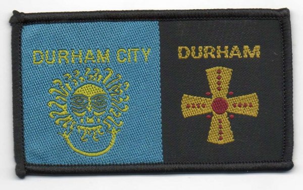 [Durham City @ District Badge]