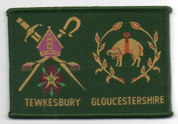 [Tewkesbury @ District Badge]
