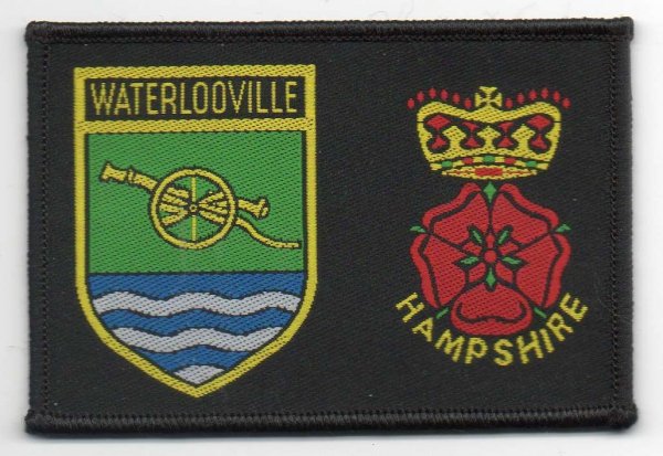 [Waterlooville @ District Badge]