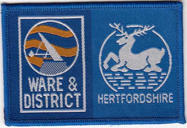 [Ware & District @ District Badge]