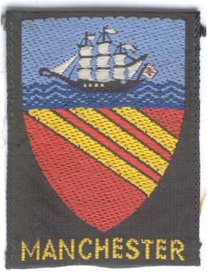 [Manchester District Badge]