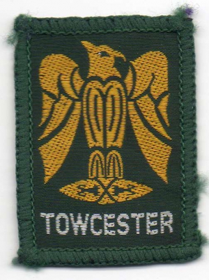 [Towcester District Badge]