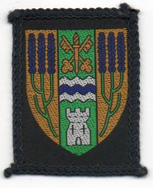 [Mitcham District Badge]