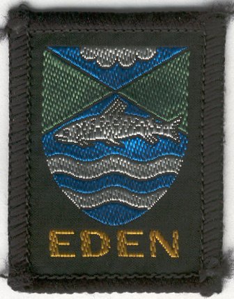 [Eden District Badge]