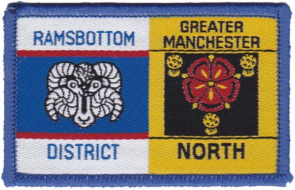 [Ramsbottom District @ District Badge]