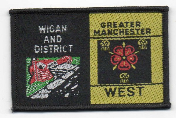 [Wigan & District @ District Badge]