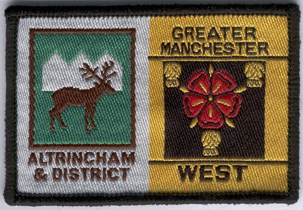 [Altrincham & District @ District Badge]